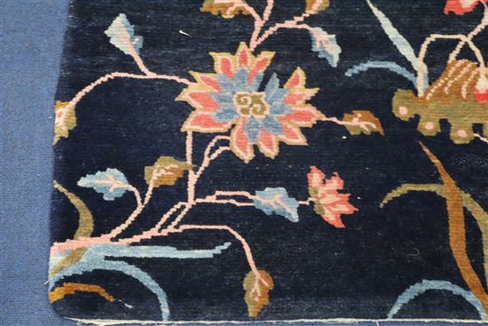 A Tibetan twelve plant rug, 5ft 7in. x 3ft 1in.